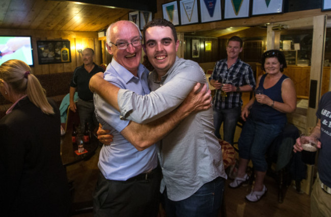 Alan Lowry (Shane Brother) celebrates Esker Hills owner Ray Molloy