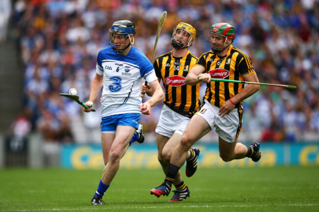 Austin Gleeson under pressure from Colin Fennelly and Kieran Joyce