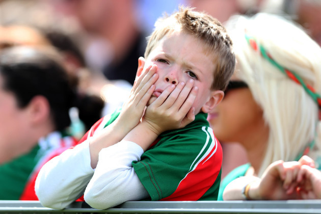A young Mayo supporter reacts after Mayo miss a chance