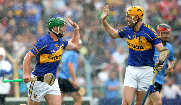 John O'Dwyer celebrates scoring the second goal for Tipperary last year against Dublin with Seamus Callanan.