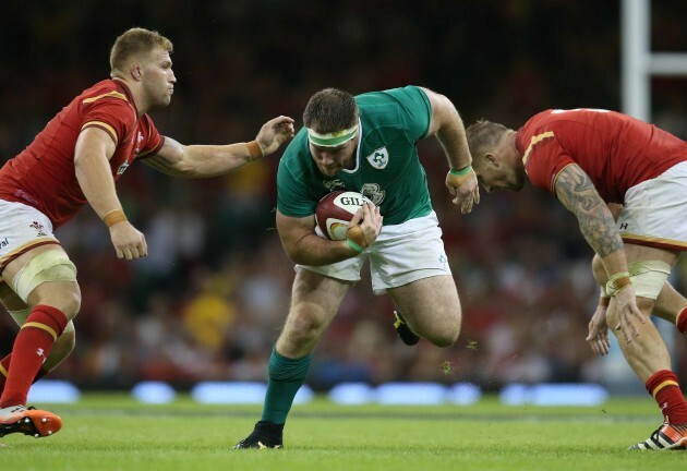 Michael Bent is tackled by Ross Moriarty and Dominic Day