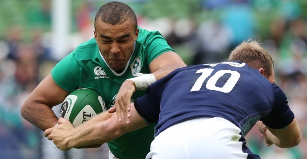 Simon Zebo is tackled by Greig Tonks