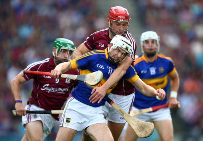 Brendan Maher is tackled by Iarla Tannian