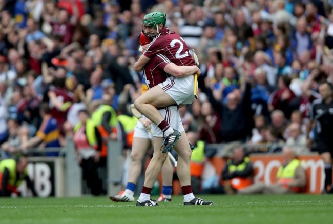 Joe Canning and winning point scorer Shane Moloney celebrate at the final whistle