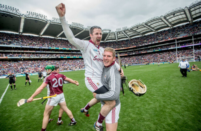 Goalkeeper Colm Callanan celebrates with goalkeeper James Skehill after the game