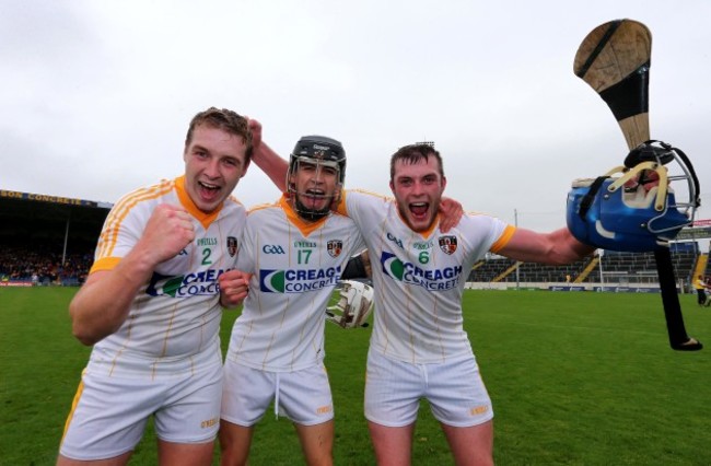 Conal Morgan, David Kearney and Paddy McNaughton celebrate at the final whistle