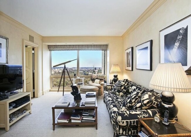 the-family-room-is-also-a-bit-small-but-the-large-floor-to-ceiling-windows-let-in-plenty-of-light