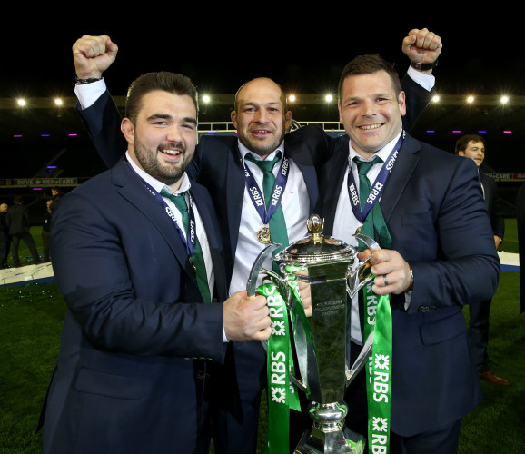Martin Moore, Rory Best and Mike Ross celebrate with the trophy