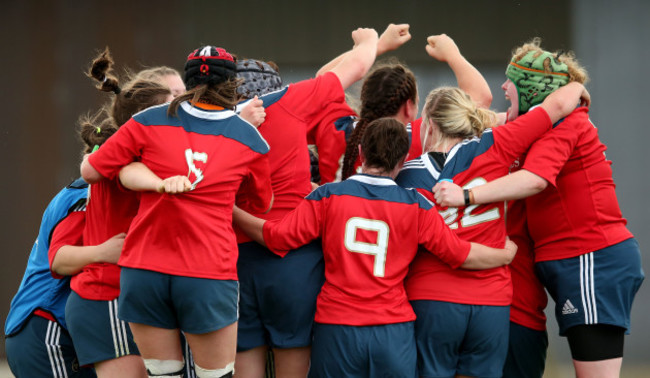 The Munster team celebrate at the final whistle