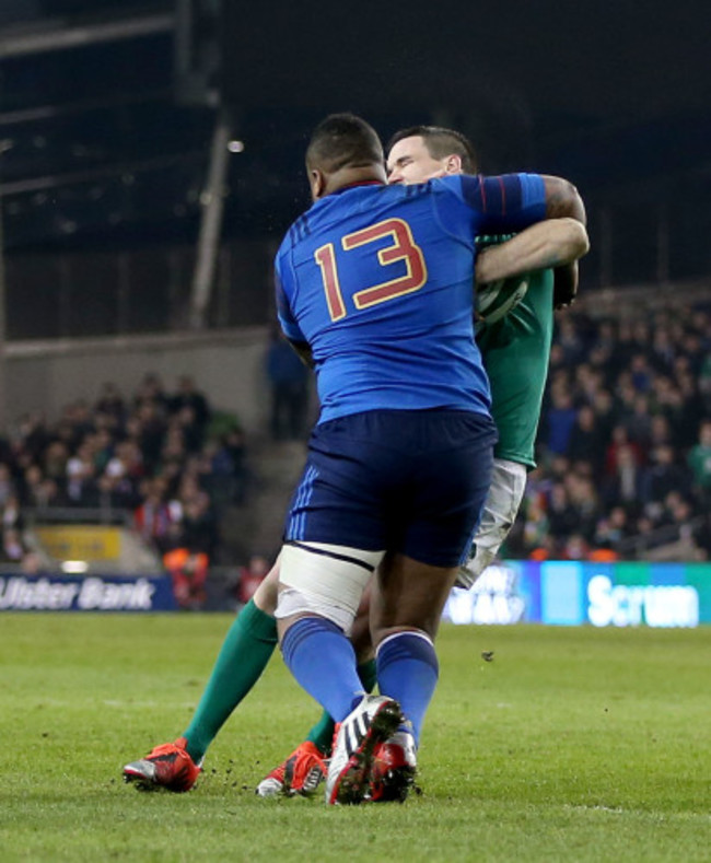 Jonathan Sexton tackled by Mathieu Bastareaud