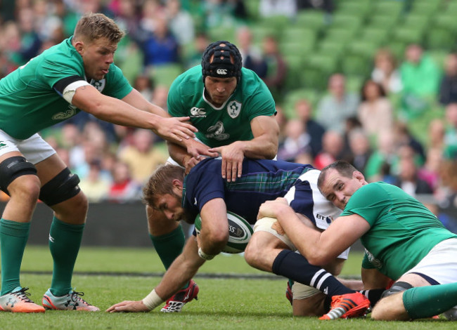 ScotlandÕs John Barclay is tackled by IrelandÕs Jordi Murphy Richardt Strauss and Devin Toner