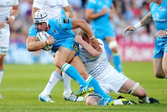 Luke Marshall is tackled by Tony Ryan