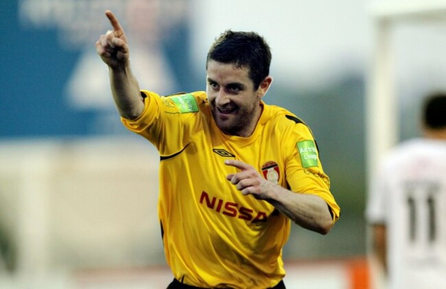 Brian Cash celebrates