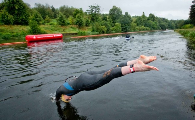 Competitors enter the Liffey