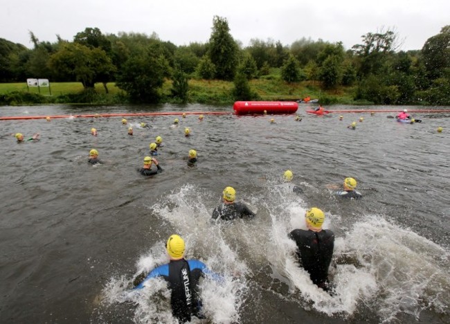 Competitors enter the Liffey