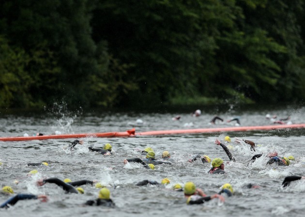 Competitors swim the Liffey during the Olympic distance