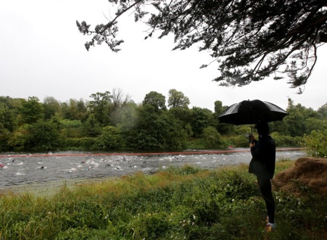 Competitors swim the Liffey during the Olympic distance