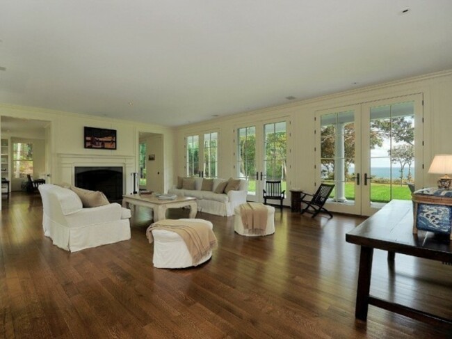 the-house-has-a-minimal-beach-chic-aesthete-with-water-views-and-private-beach-access
