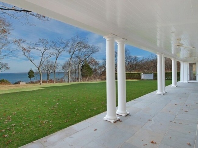 in-the-rear-of-the-house-roman-columns-frame-picturesque-views-of-the-atlantic-ocean