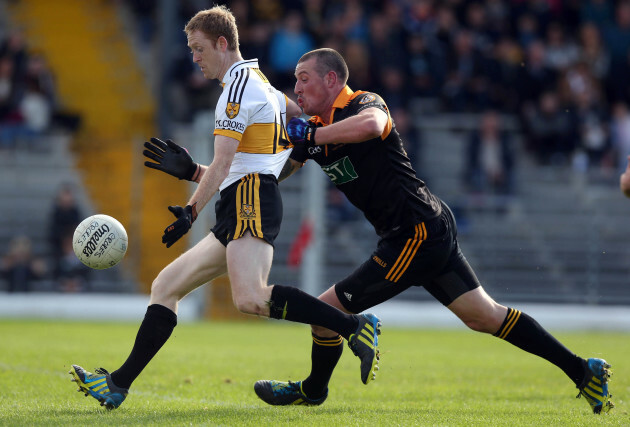 Colm Cooper scores the first goal of the game despite the attentions of Kieran Donaghy 20/10/2013