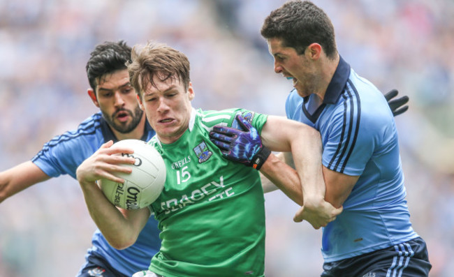 Cian OÕSullivan and Rory OÕCarroll with Tomas Corrigan