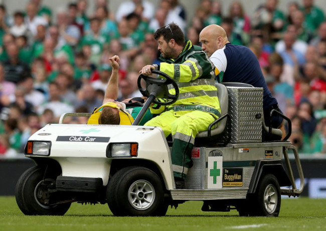 Keith Earls signals to the crowd as he is replaced