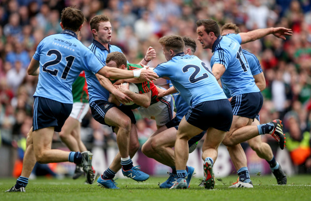 Michael Fitzsimons, Jack McCaffrey, Philly McMahon,Tomas Brady, John Small and Paul Flynn foul Colm Boyle resulting in a late penalty