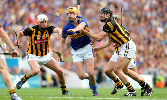 Jackie Tyrell and Michael Fennelly with Seamus Callanan