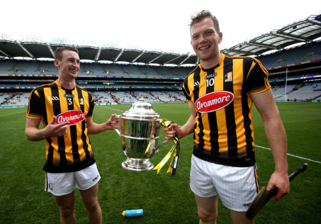 Joey Holden and Walter Walsh celebrate with the trophy