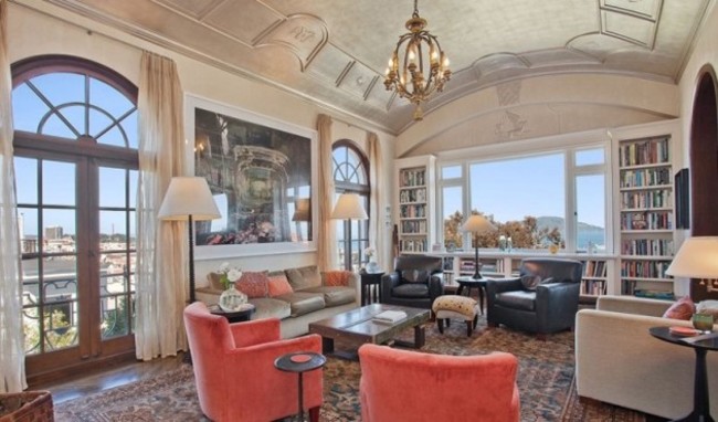 the-living-room-has-a-silver-leaf-ceiling-and-beautiful-views-of-the-bay