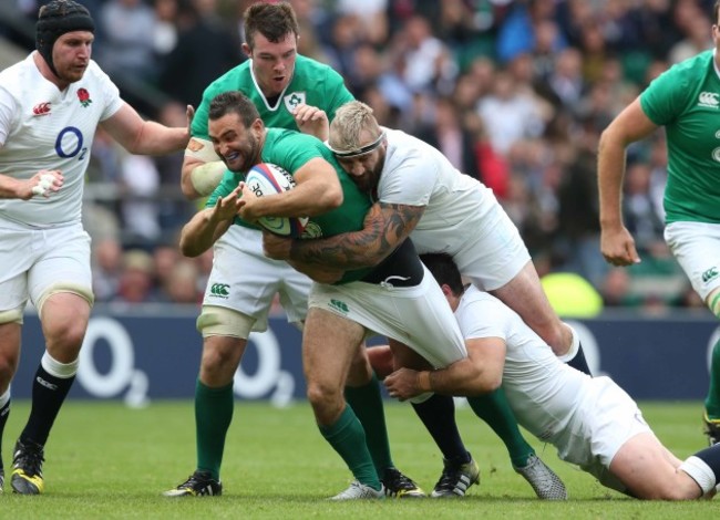 Dave Kearney is tackled by Joe Marler and Ben Youngs