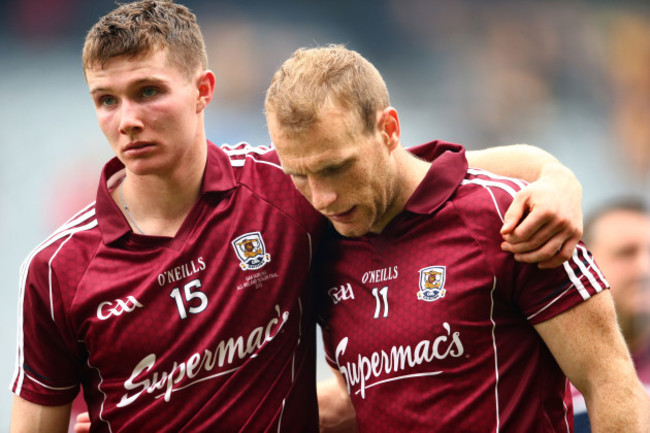 A dejected Cathal Mannion and Cyril Donnellan