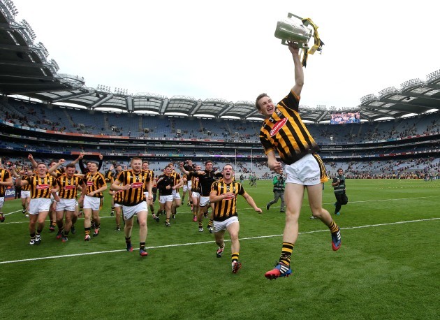 Joey Holden celebrates with the Liam McCarthy Cup