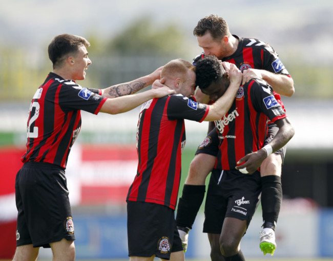 Isamahil Akinade celebrates scoring with teammates