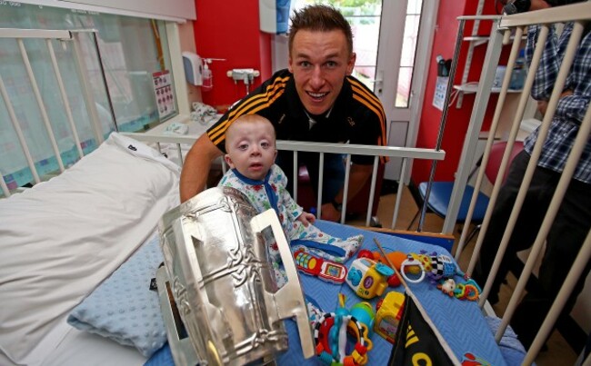 Cillian Buckley and Conor Travers with The Liam McCarthy Cup