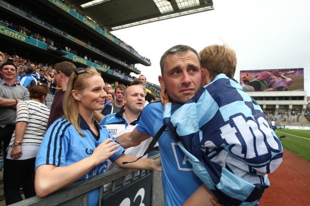 Alan Brogan with his wife Lydia and son Jamie after the game