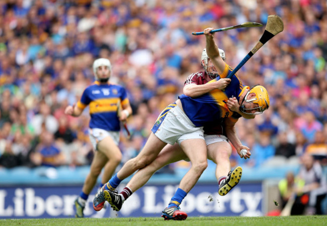 John Hanbury hauls down Seamus Callanan in the All-Ireland semi-final