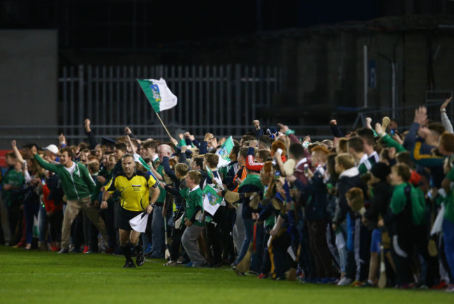 Limerick supporters prepare to invade the pitch