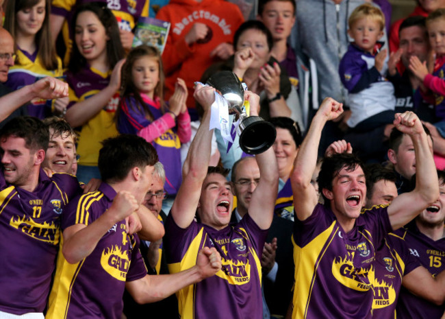 Eoin Conroy lifts the trophy