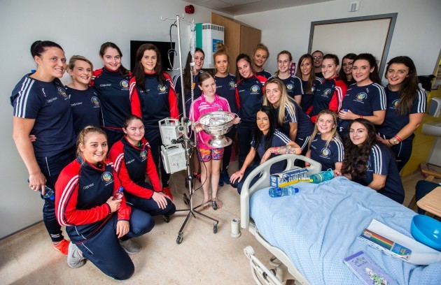 The Cork camogie players and the O'Duffy cup with Aoife Lucey
