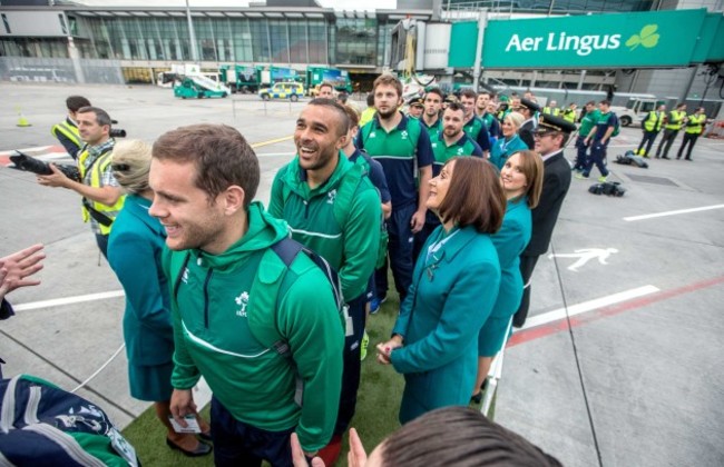 Irish rugby players boarding the Aer Lingus Green Spirit aircraft with Aer Lingus staff forming a guard of honour