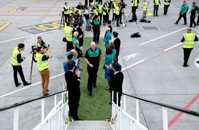 Aer Lingus staff members show their &lsquo;Green Spirit&rsquo; as they get behind the Irish rugby team for their final send off at Dublin Airport