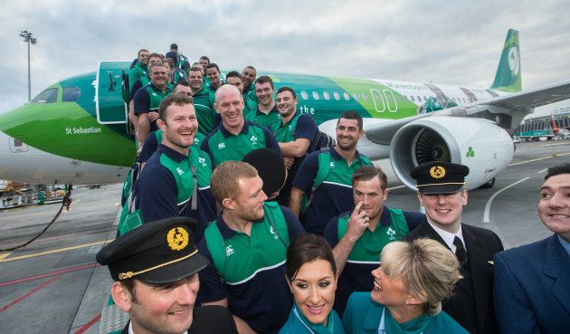 Irish rugby players boarding the Aer Lingus Green Spirit aircraft with Aer Lingus staff forming a guard of honour