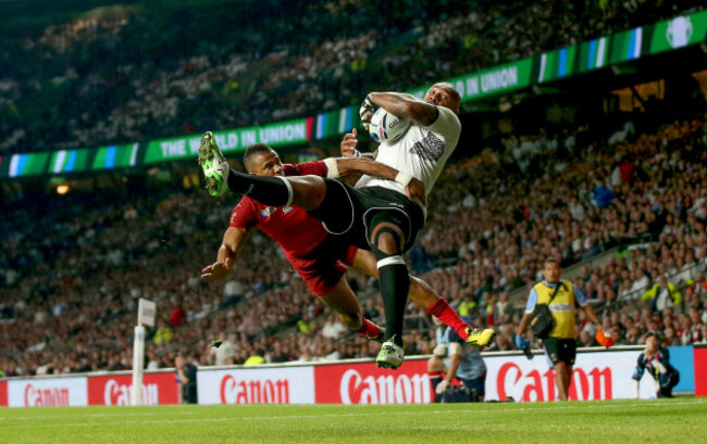 Nemani Nadolo scores his side's first try despite Anthony Watson