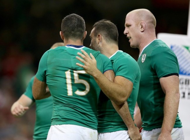 Rob Kearney celebrates scoring their sixth try with Dave Kearney and Paul O'Connell