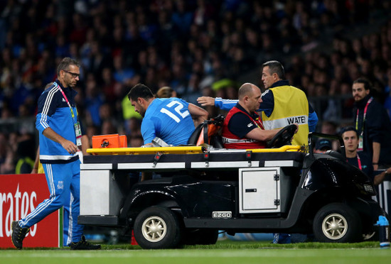 Andrea Masi leaves the field injured