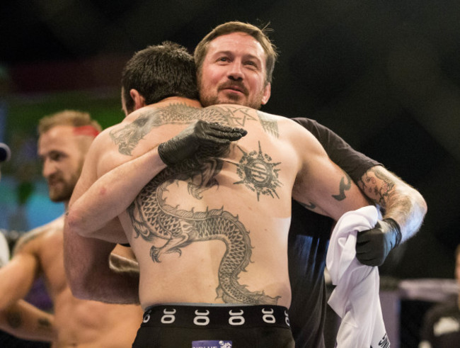 Paul Byrne celebrates with his coach John Kavanagh