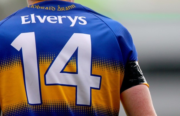 Tipperary players wear black arm bands in memory of Ediie Connolly who died during the week