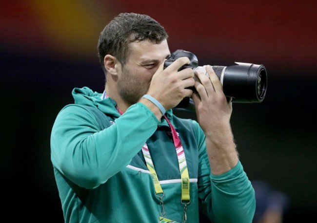 Robbie Henshaw takes pictures of the Irish squad training