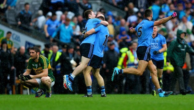 James McCarthy, Jack McCaffrey and Paul Flynn celebrate as Killian Young sits dejected